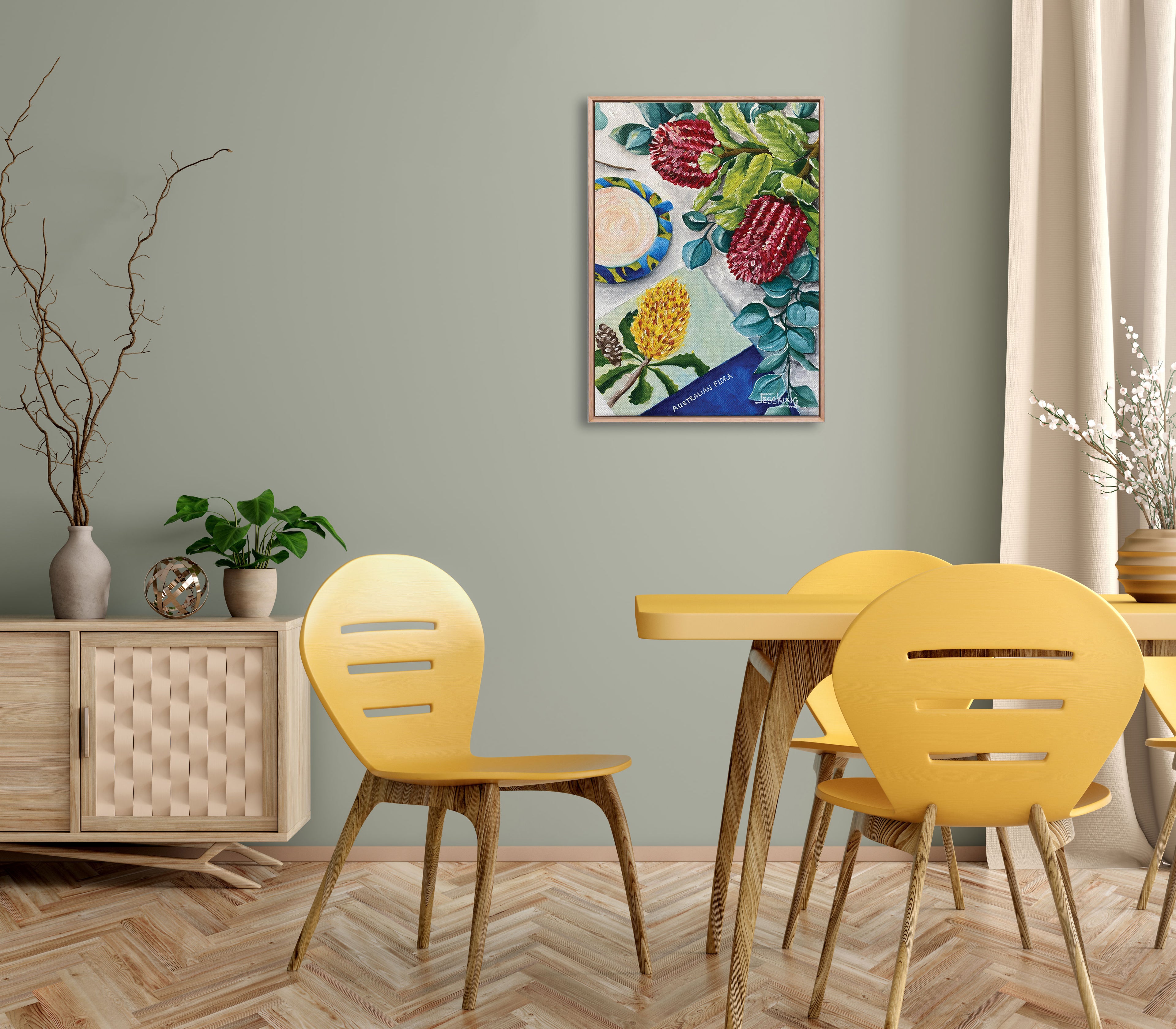 Dining room with yellow chairs, wooden table, and a colorful abstract painting on the wall.