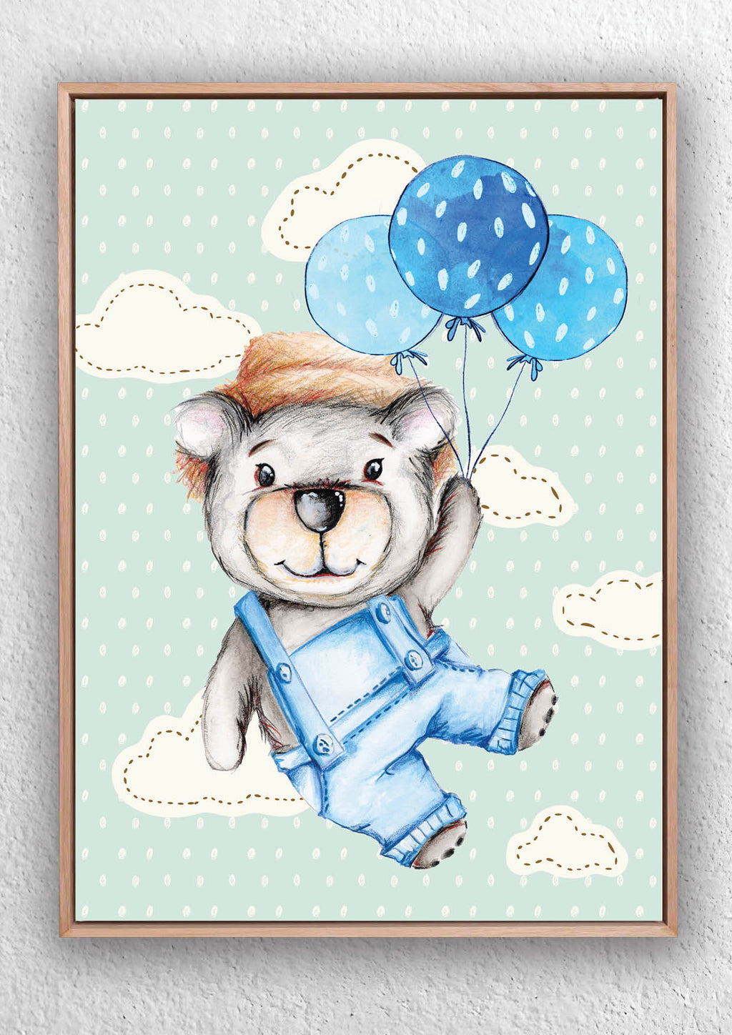 Framed art print by Jess King of a bear in overalls with blue balloons on a polka dot background.